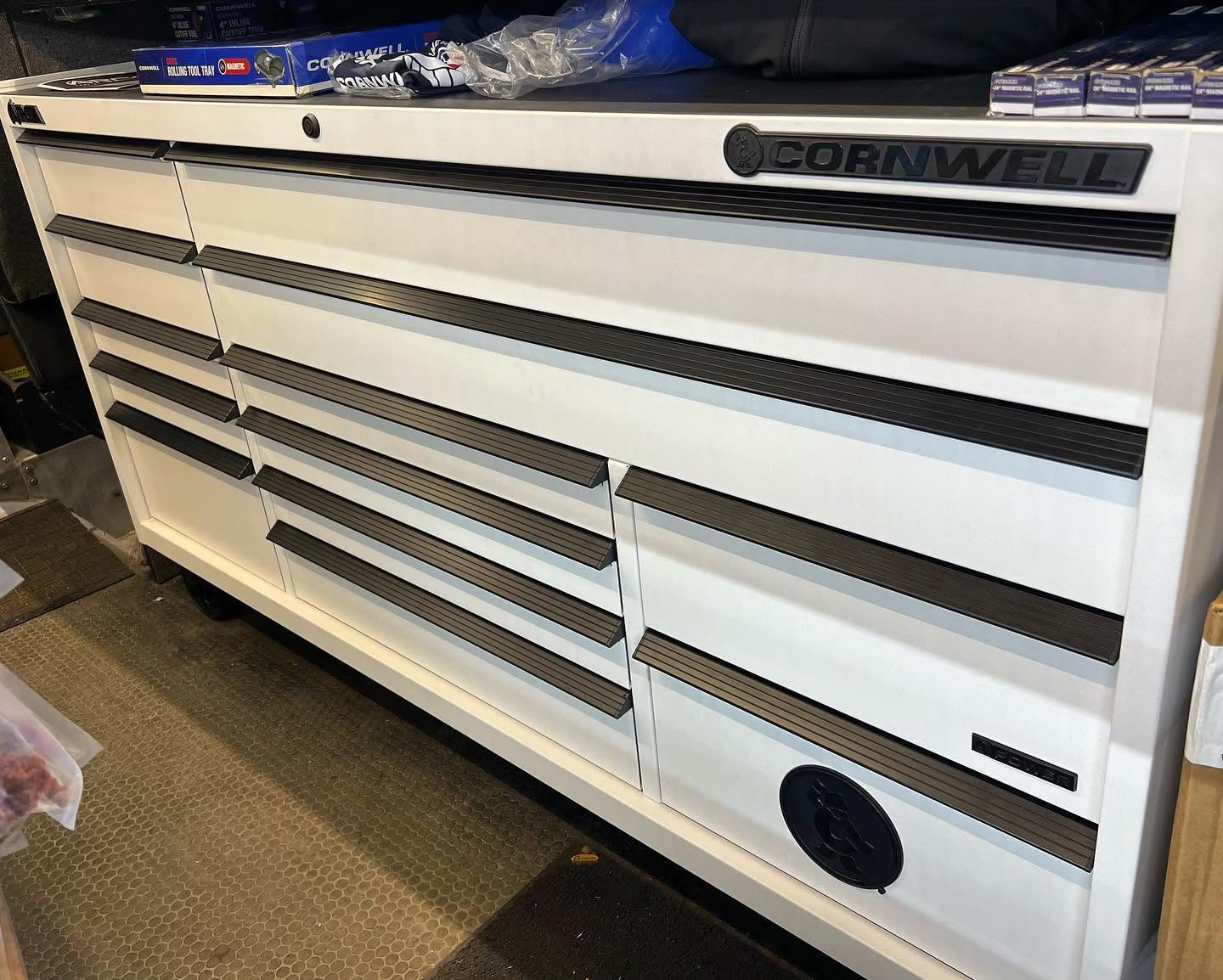 A white Cornwell roll cab delivered into a shop, the kind of storage the Tool Co truck brings to Weslaco stops