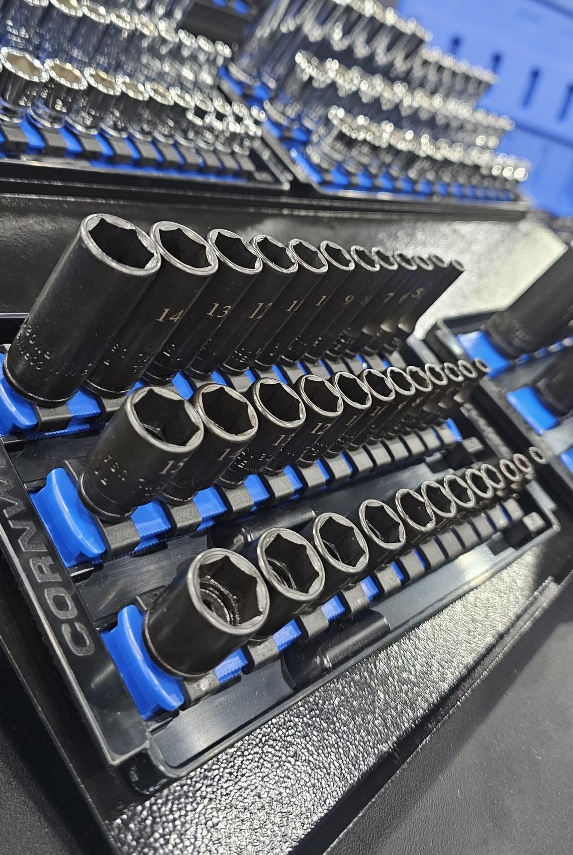 Rails of Cornwell sockets lined up on the Tool Co truck, the everyday line the truck carries and the catalog fills in